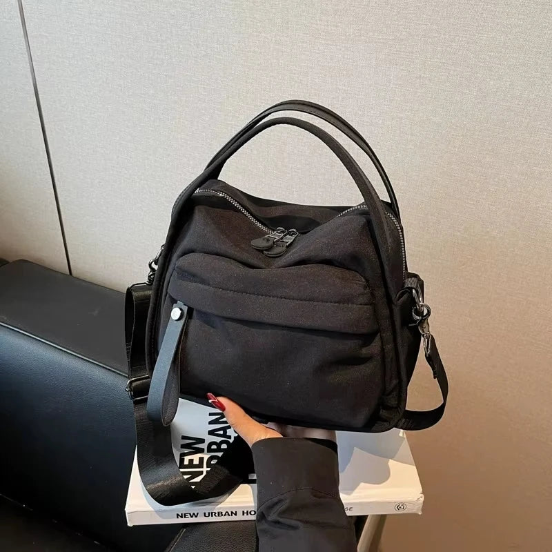 NORELLE – LIGHTWEIGHT OXFORD CANVAS CROSSBODY BAG